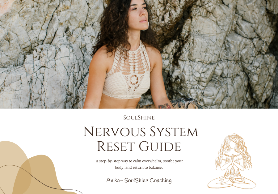 A woman sitting in a sunlit wildflower field, journaling her intentions for manifestation with SoulShine.